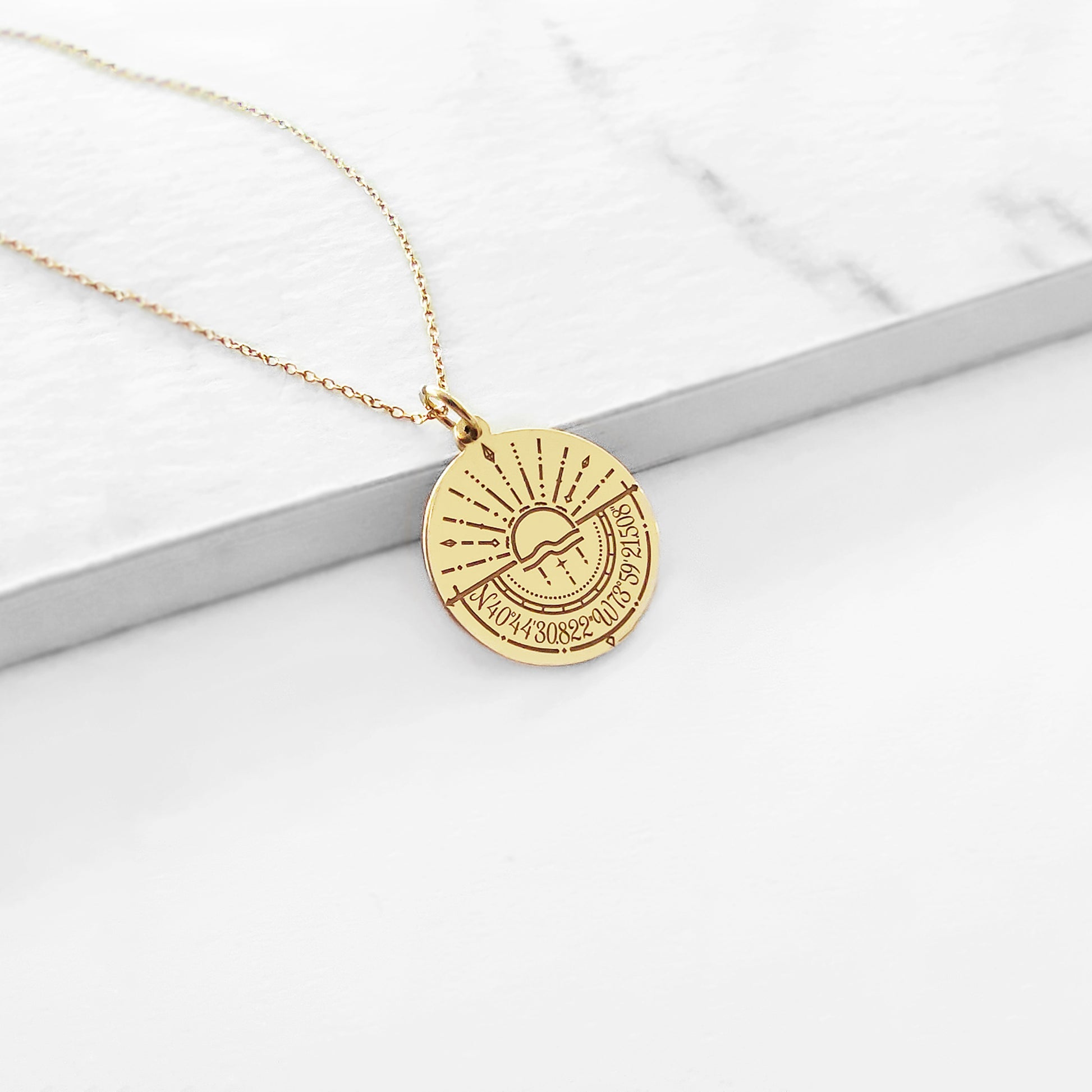 14k solid yellow gold disc pendant necklace engraved with a compass and personalized coordinates