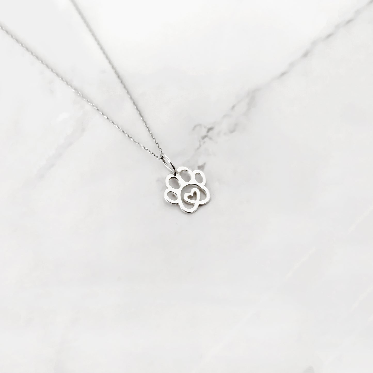 Tiny Dog Paw Print Pendant Necklace in Solid Gold