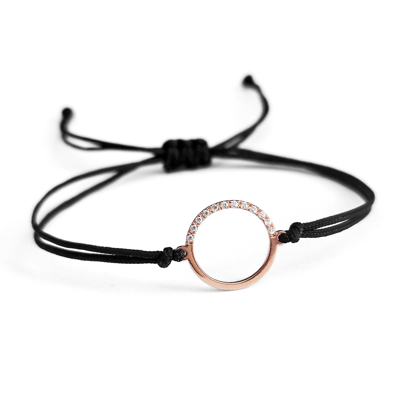 solid rose gold bracelet with an open circle charm set with 12 white diamonds