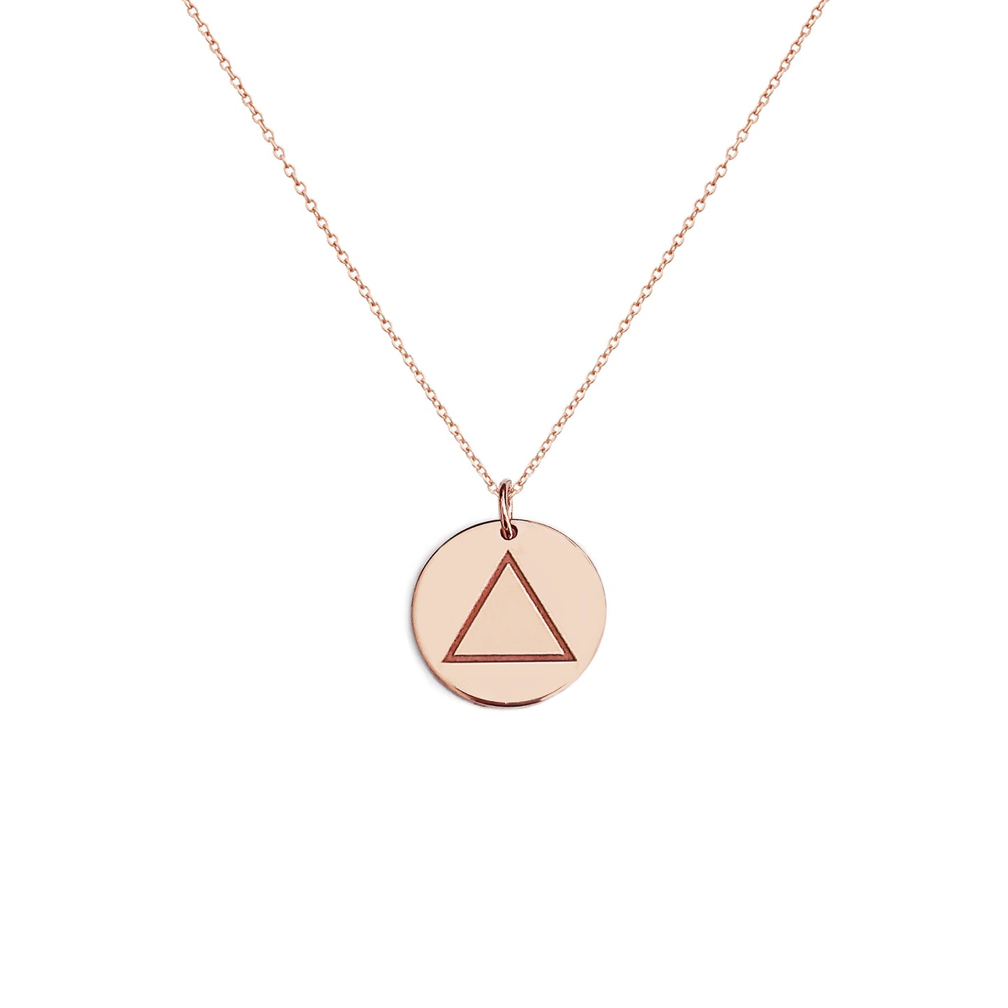 solid rose gold necklace with a 14mm disc pendant engraved with the fire element