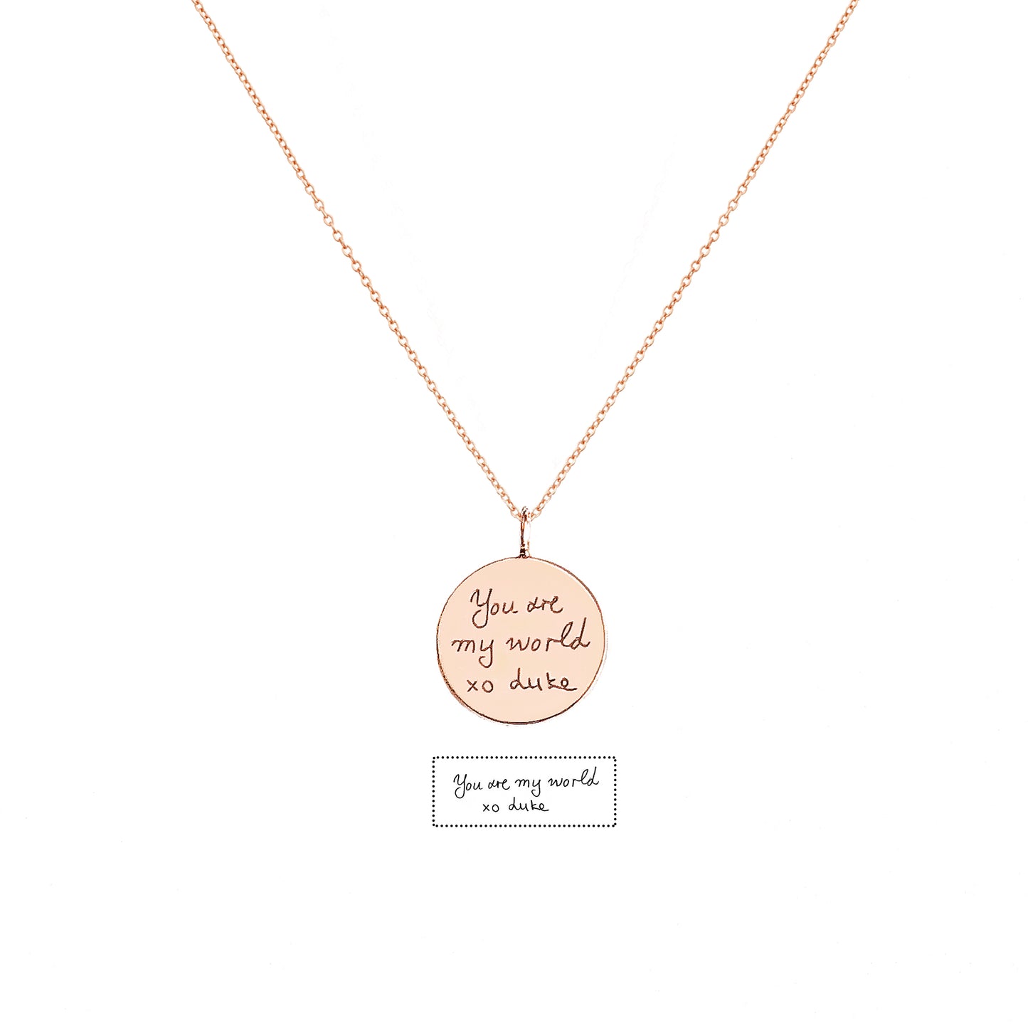 solid rose gold necklace with a round pendant with custom handwritten engraving