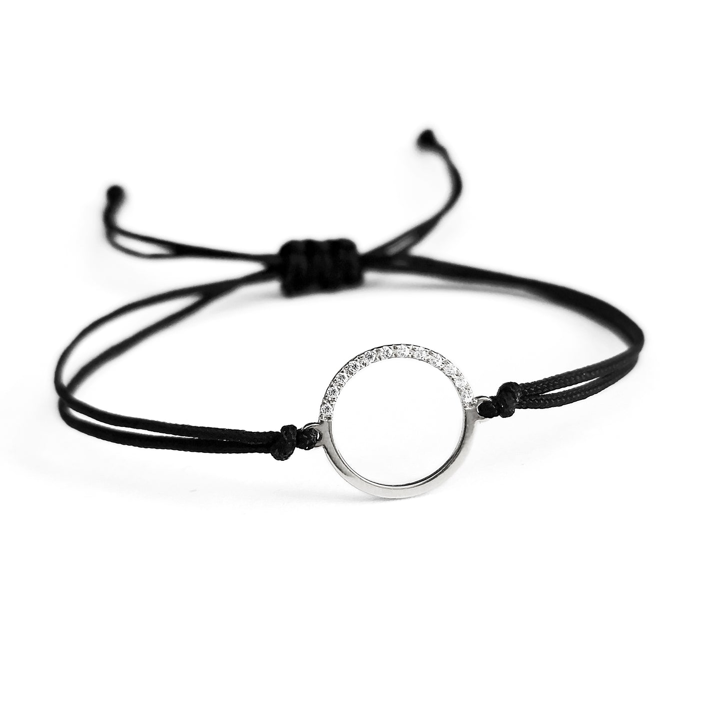 solid white gold bracelet with an open circle charm set with 12 white diamonds