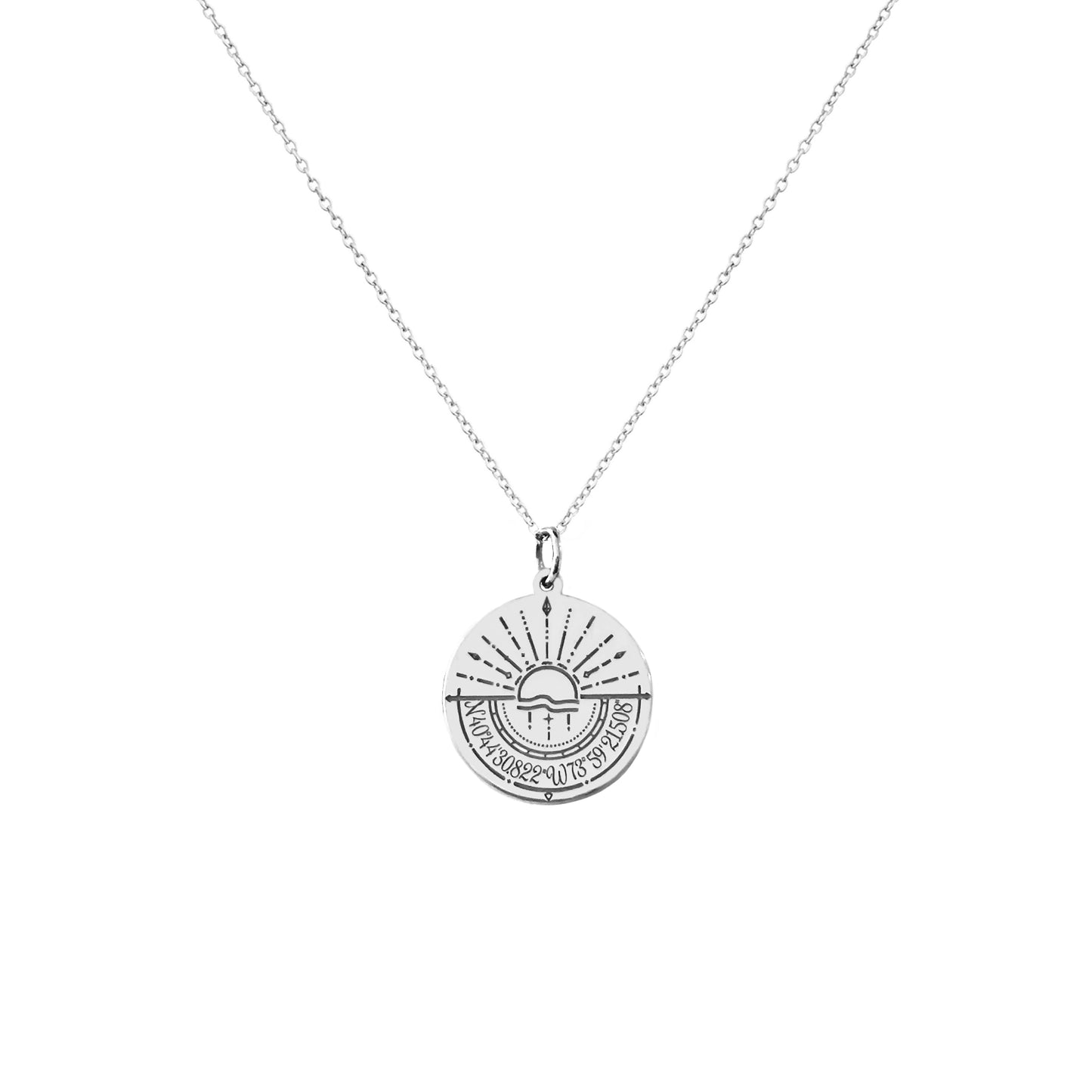 solid white gold disc pendant necklace engraved with a compass and personalized coordinates
