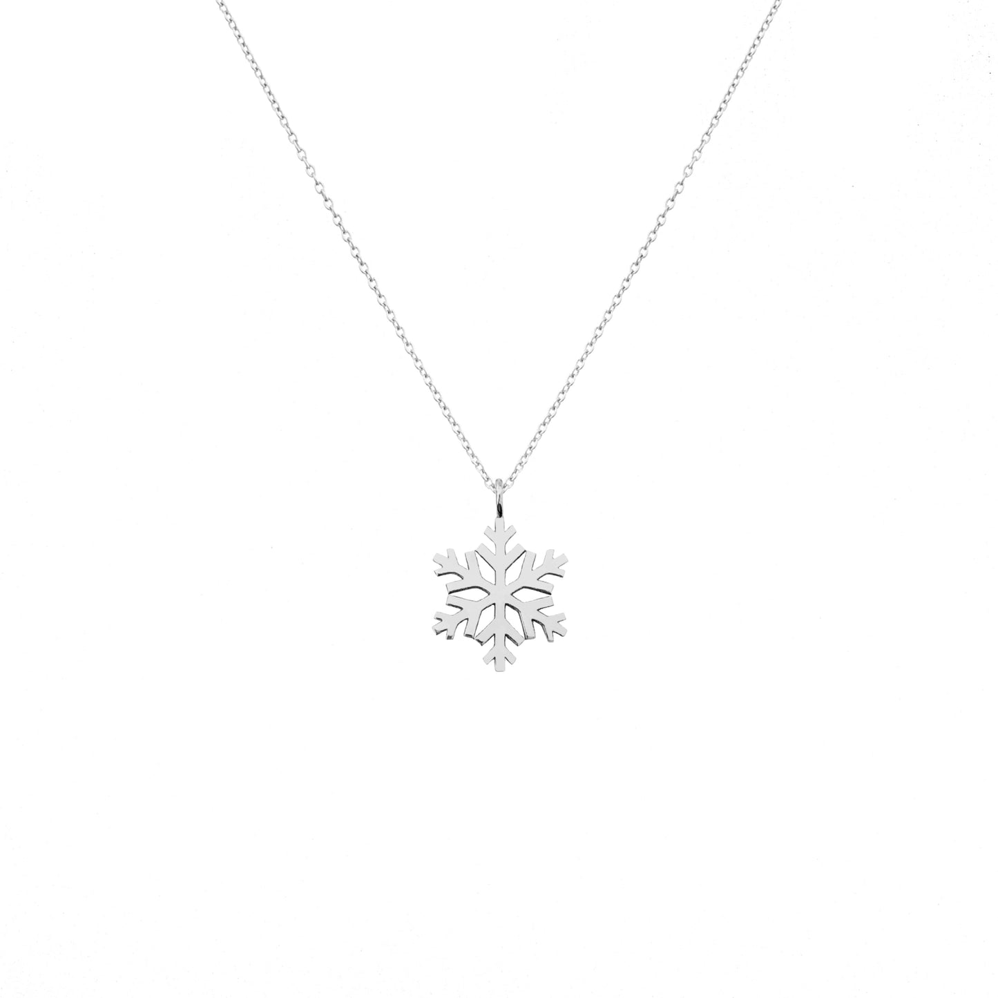 solid white gold necklace with a small pendant in the shape of a snowflake