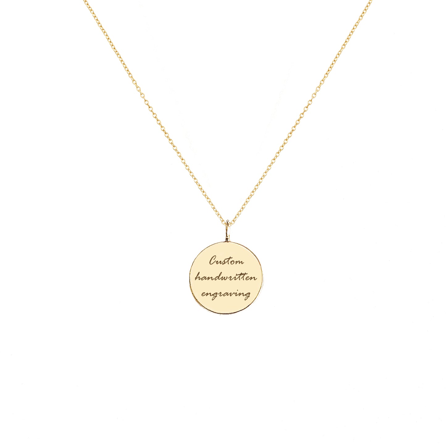 Gold necklace with a round pendant with handwritten engraving on a white background