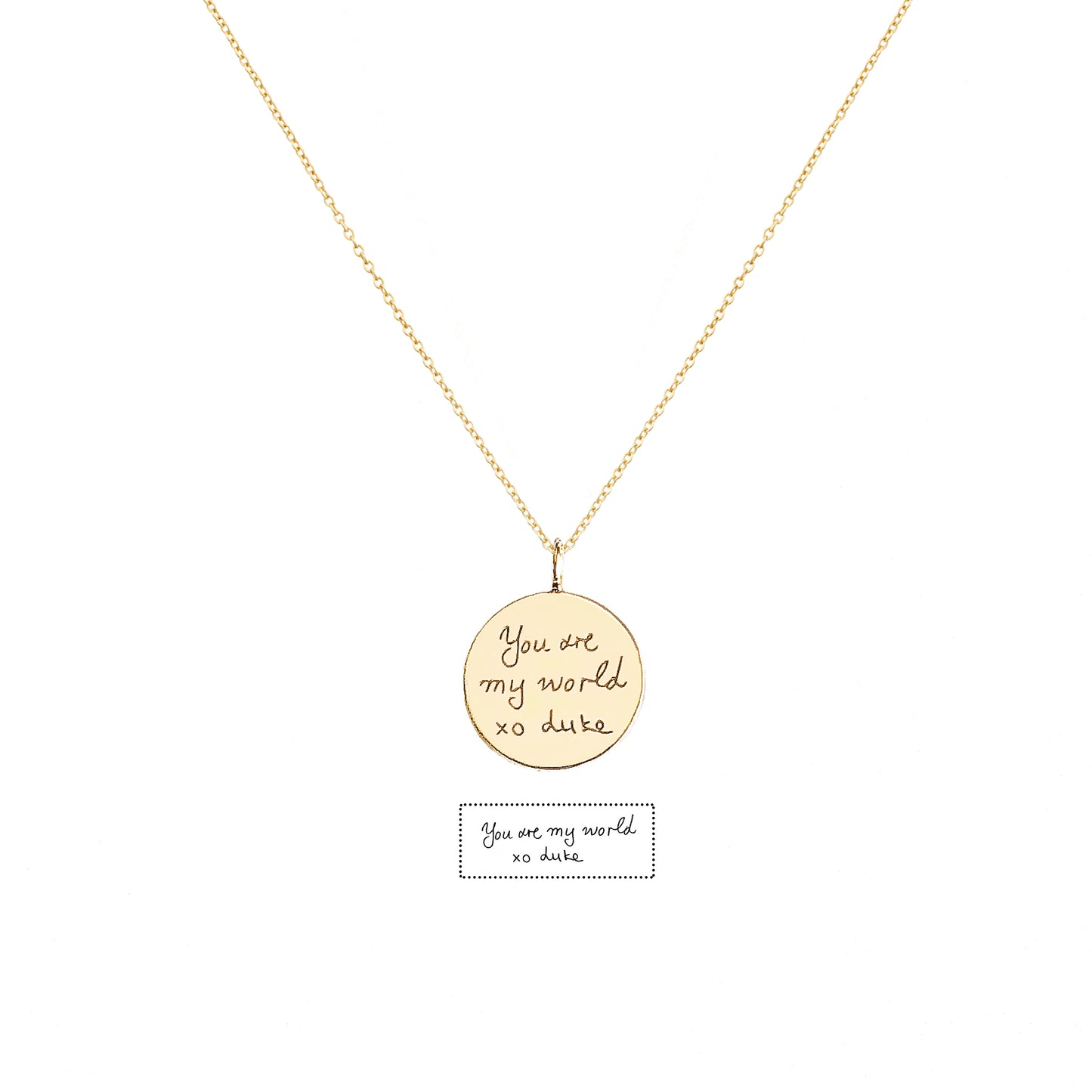 solid yellow gold necklace with a round pendant with custom handwritten engraving