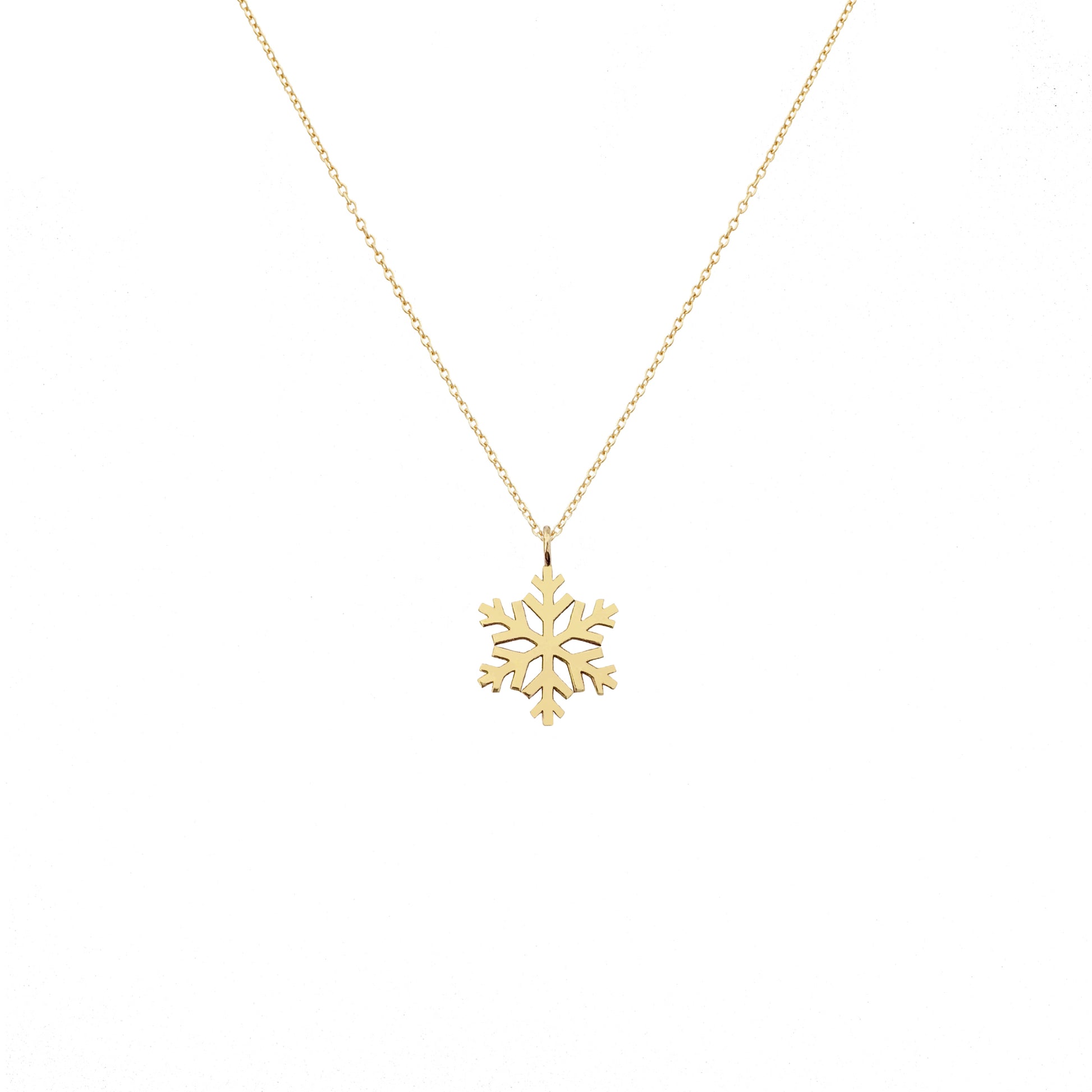 solid yellow gold necklace with a small pendant in the shape of a snowflake