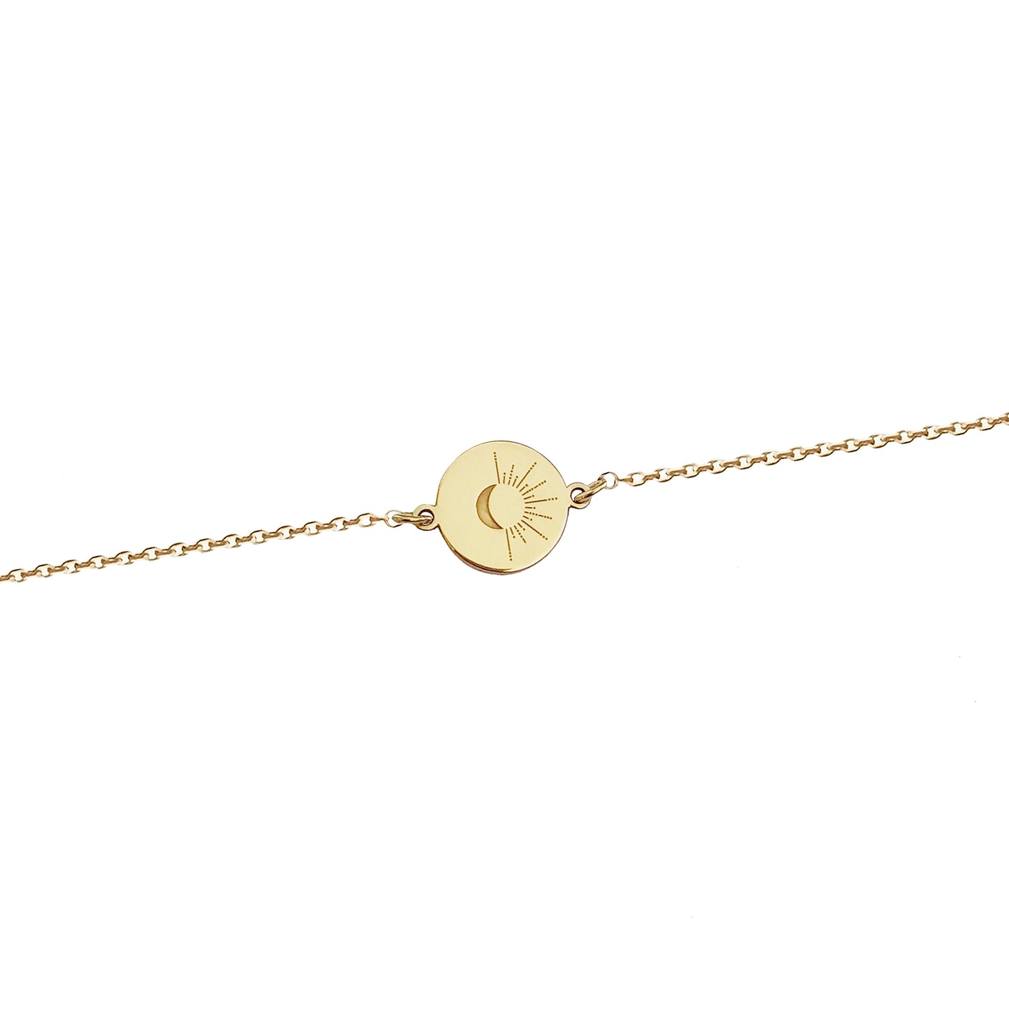 solid yellow gold disc charm bracelet engraved with a crescent moon and sun rays