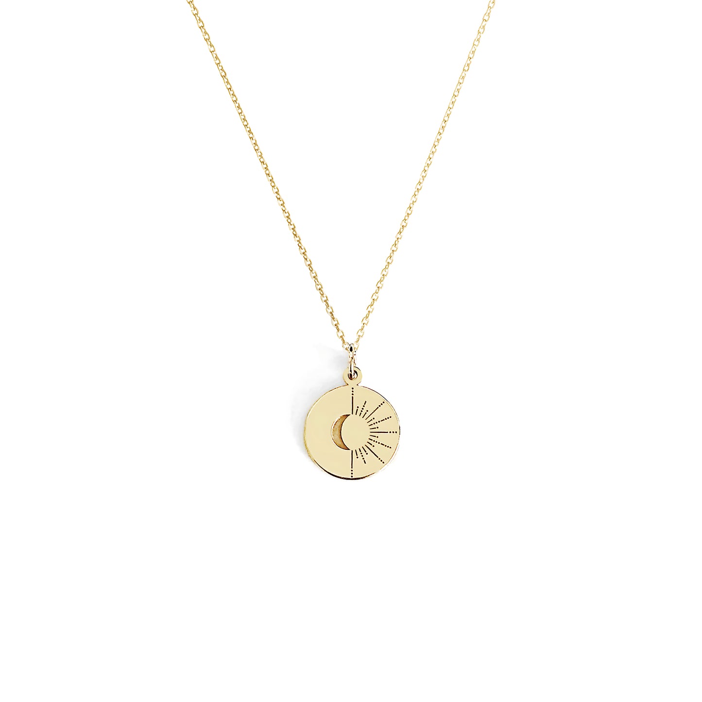 solid yellow gold disc pendant necklace engraved with a crescent moon and sun rays