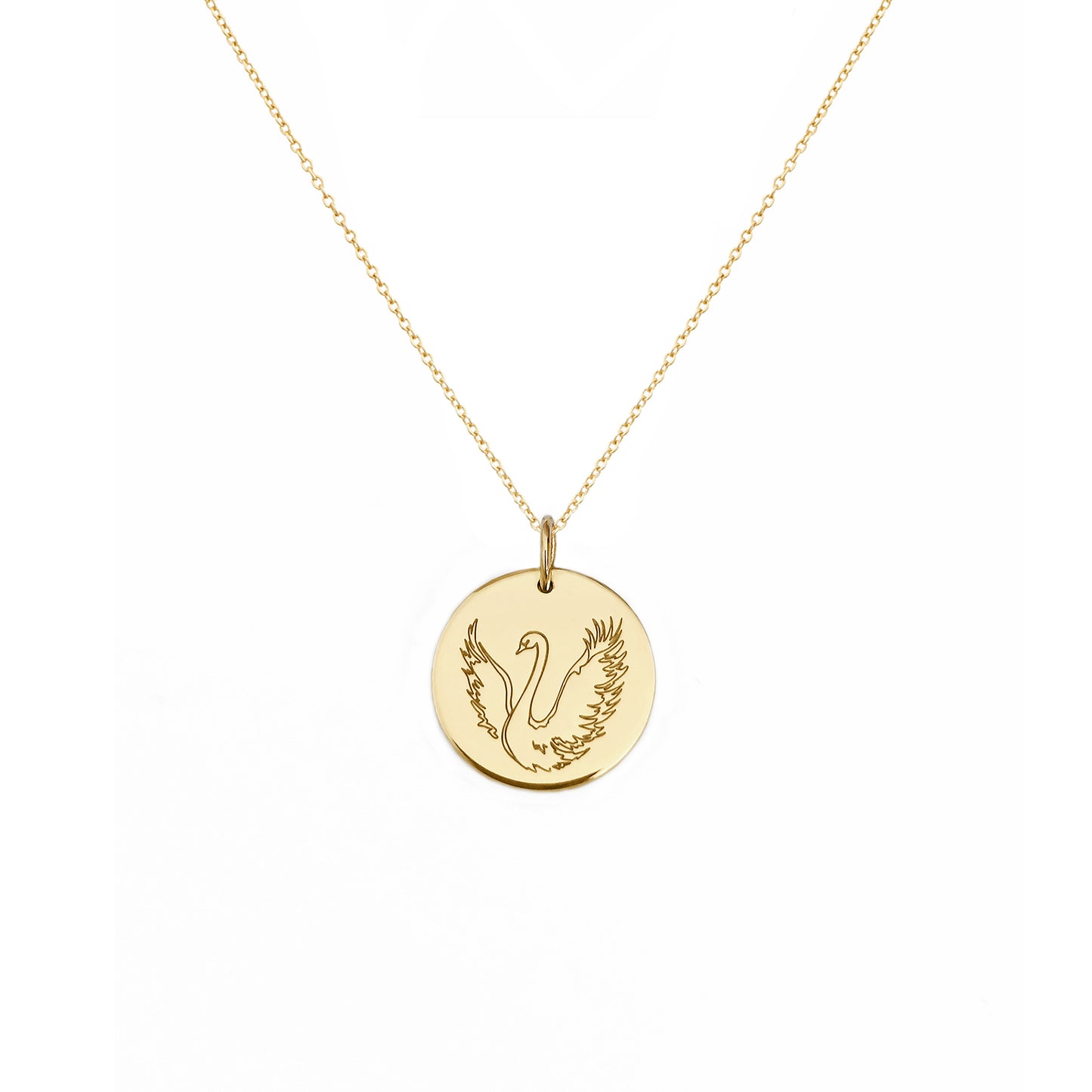 solid yellow gold necklace with a 14mm disc pendant engraved with a swan with open wings