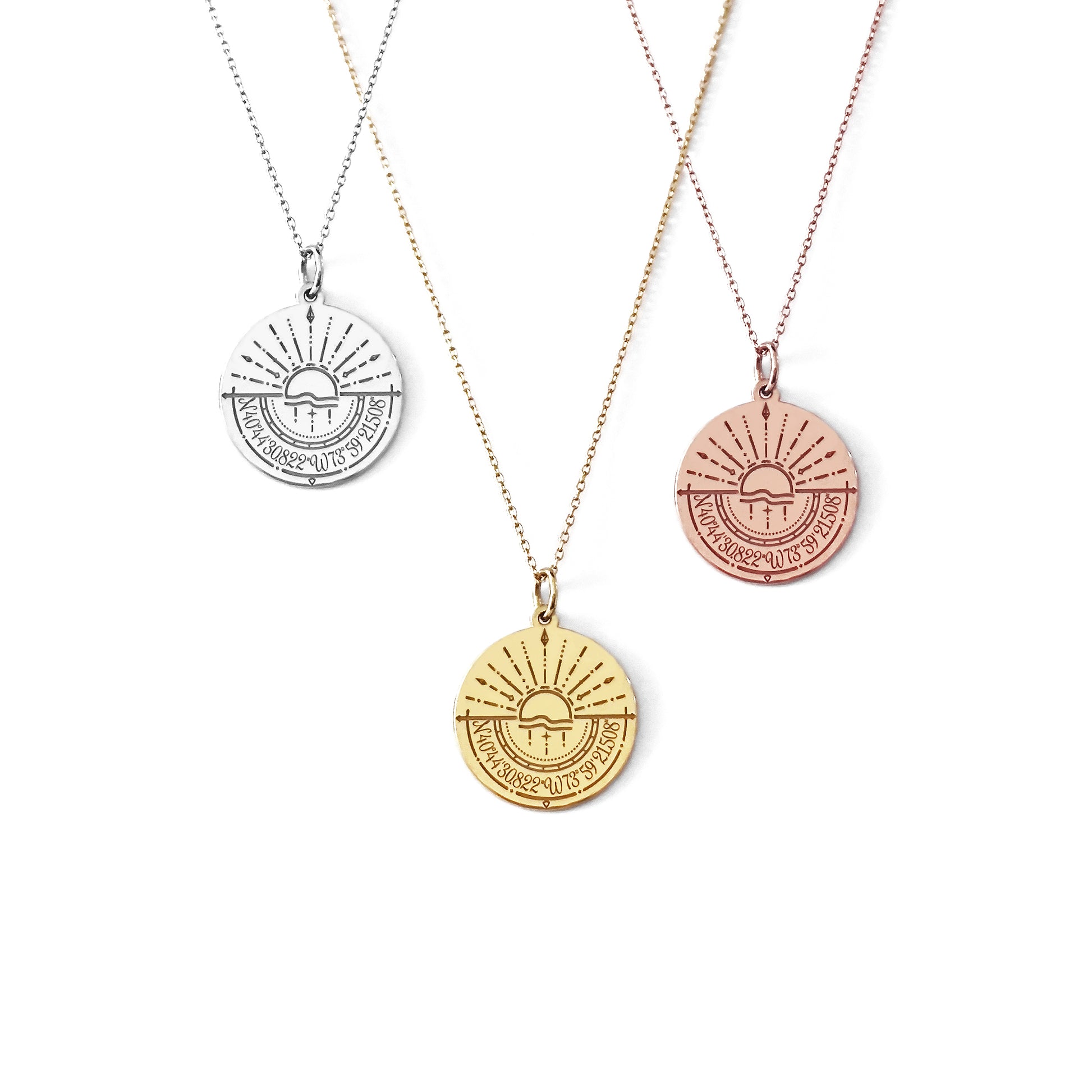 solid yellow, rose and white gold disc pendant necklaces engraved with a compass and personalized coordinates