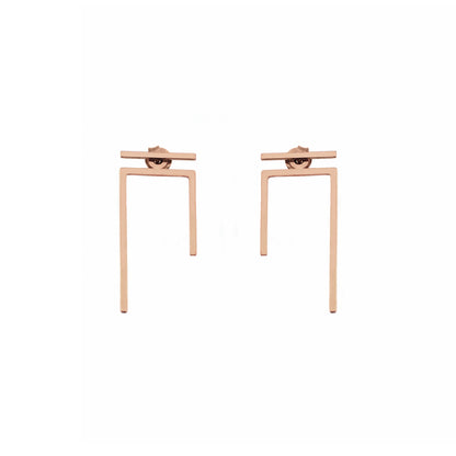 a pair of solid rose gold staple line jacket earring