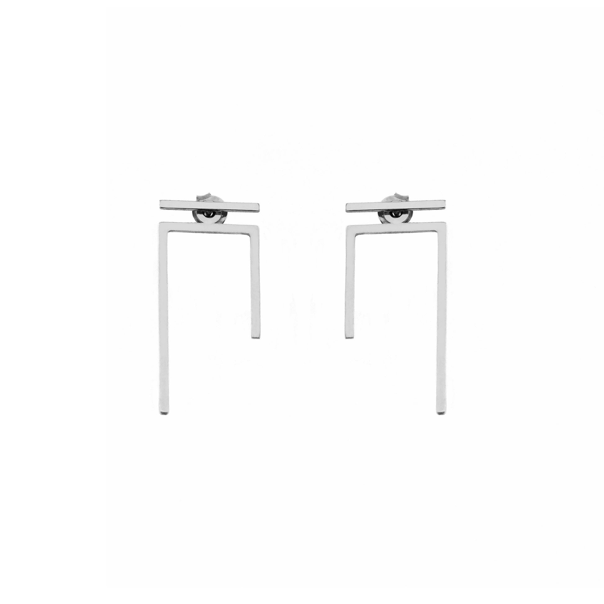 a pair of solid white gold staple line jacket earring