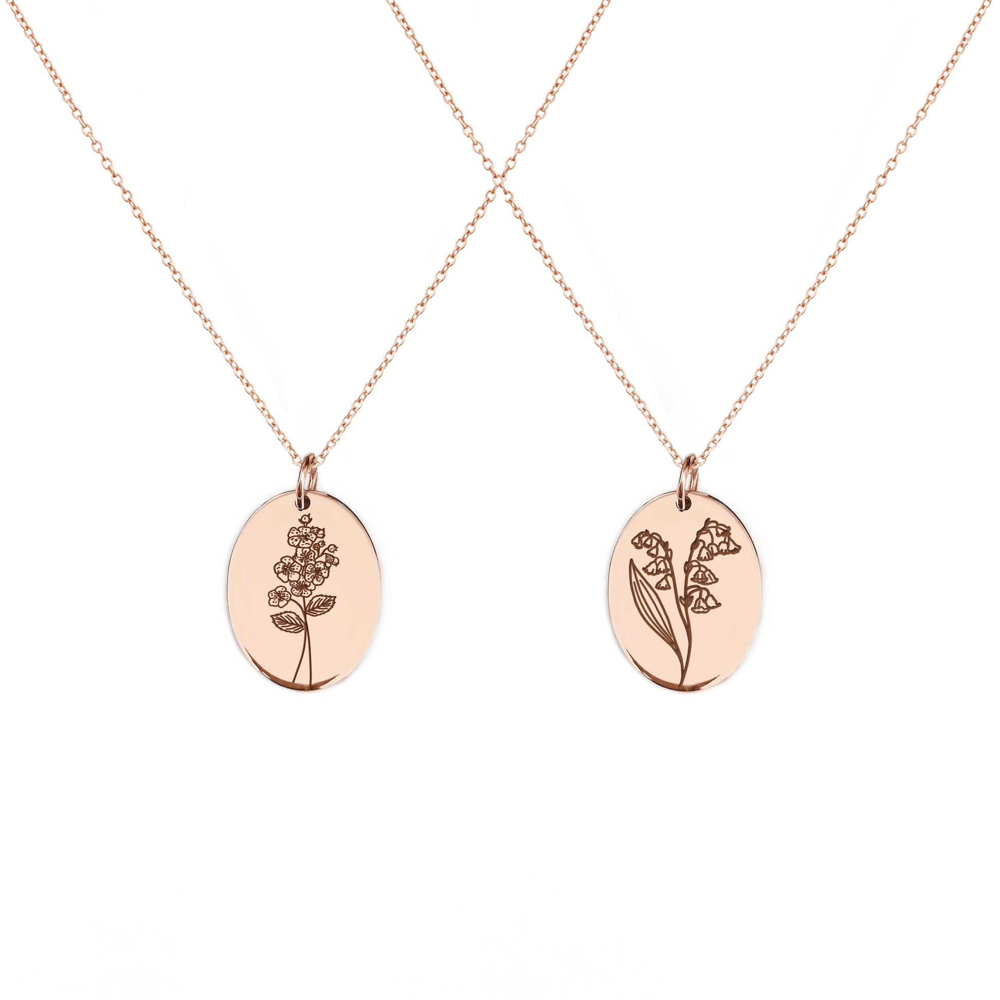 two solid rose gold oval pendant necklaces engraved with the birth flowers of May Hawthorn and Lily of the Valley