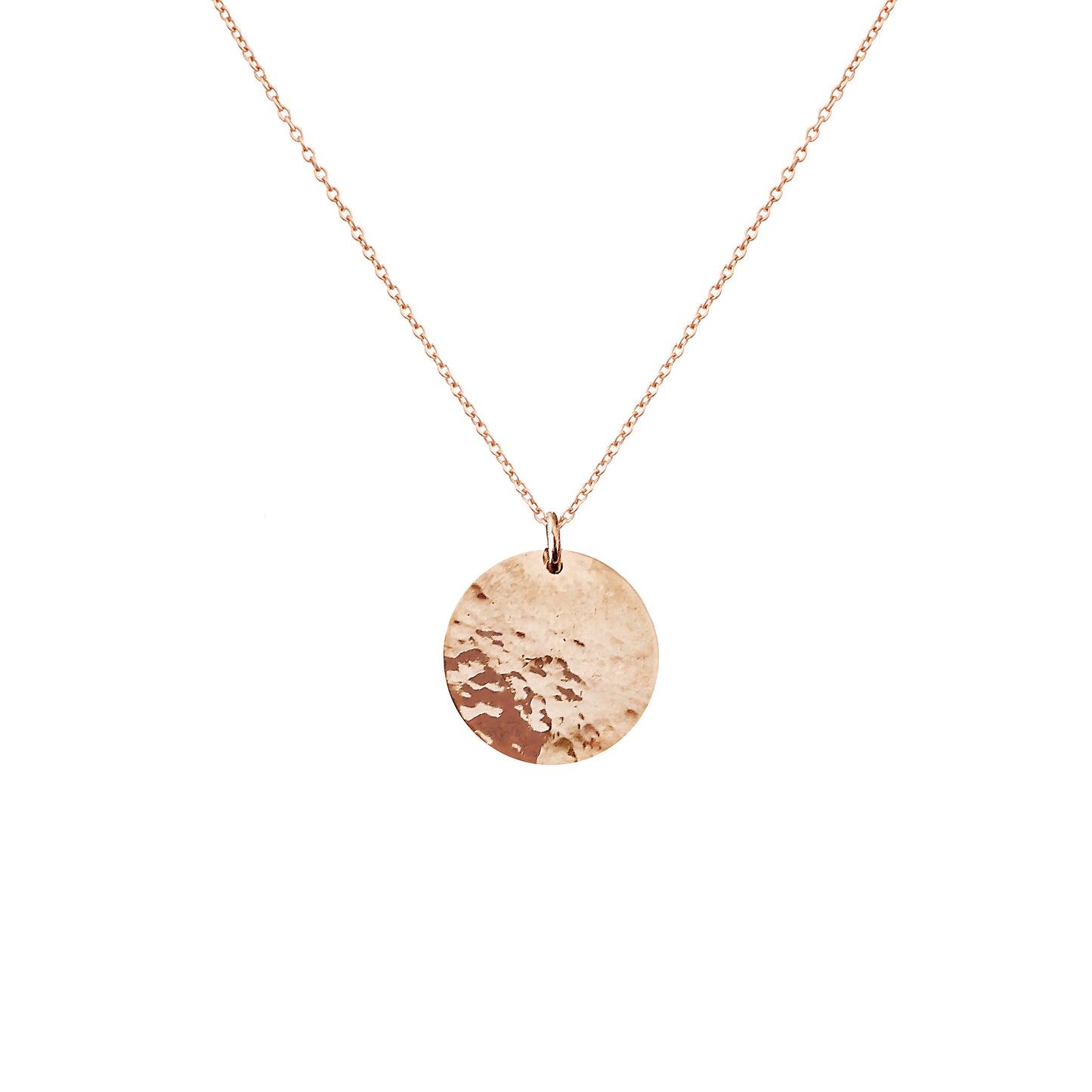 Solid rose gold necklace with a round hammered pendant on a white background