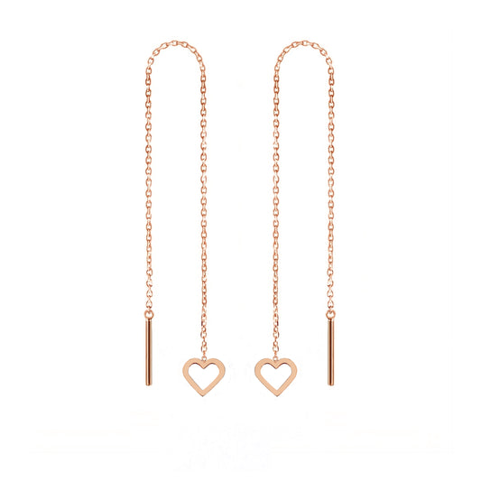 pair of solid rose gold threader pull through earrings with tiny hearts