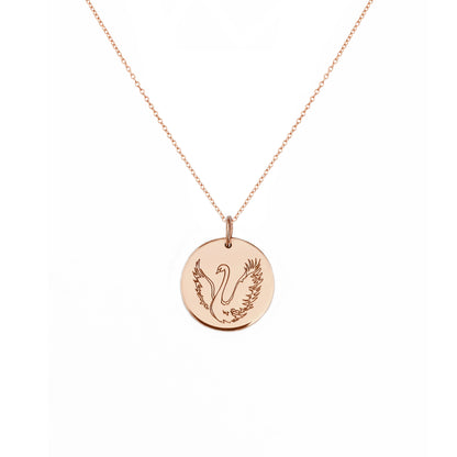 solid rose gold necklace with a 14mm disc pendant engraved with a swan with open wings