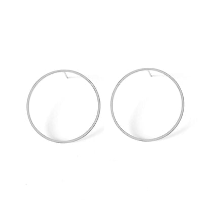 a pair of big open circle hoop stud earrings in solid white gold