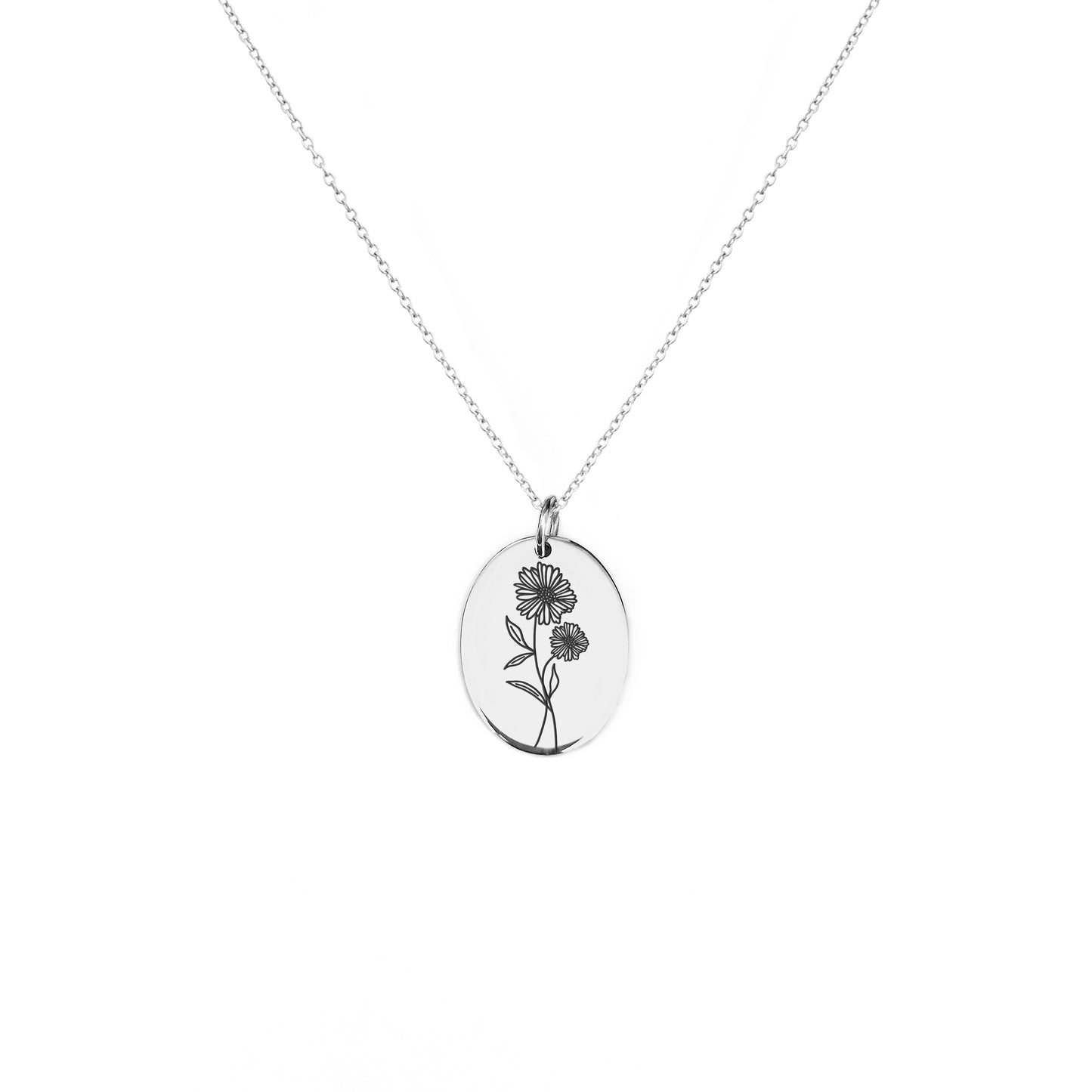 solid white gold oval pendant necklace engraved with the birth flower of April Daisy