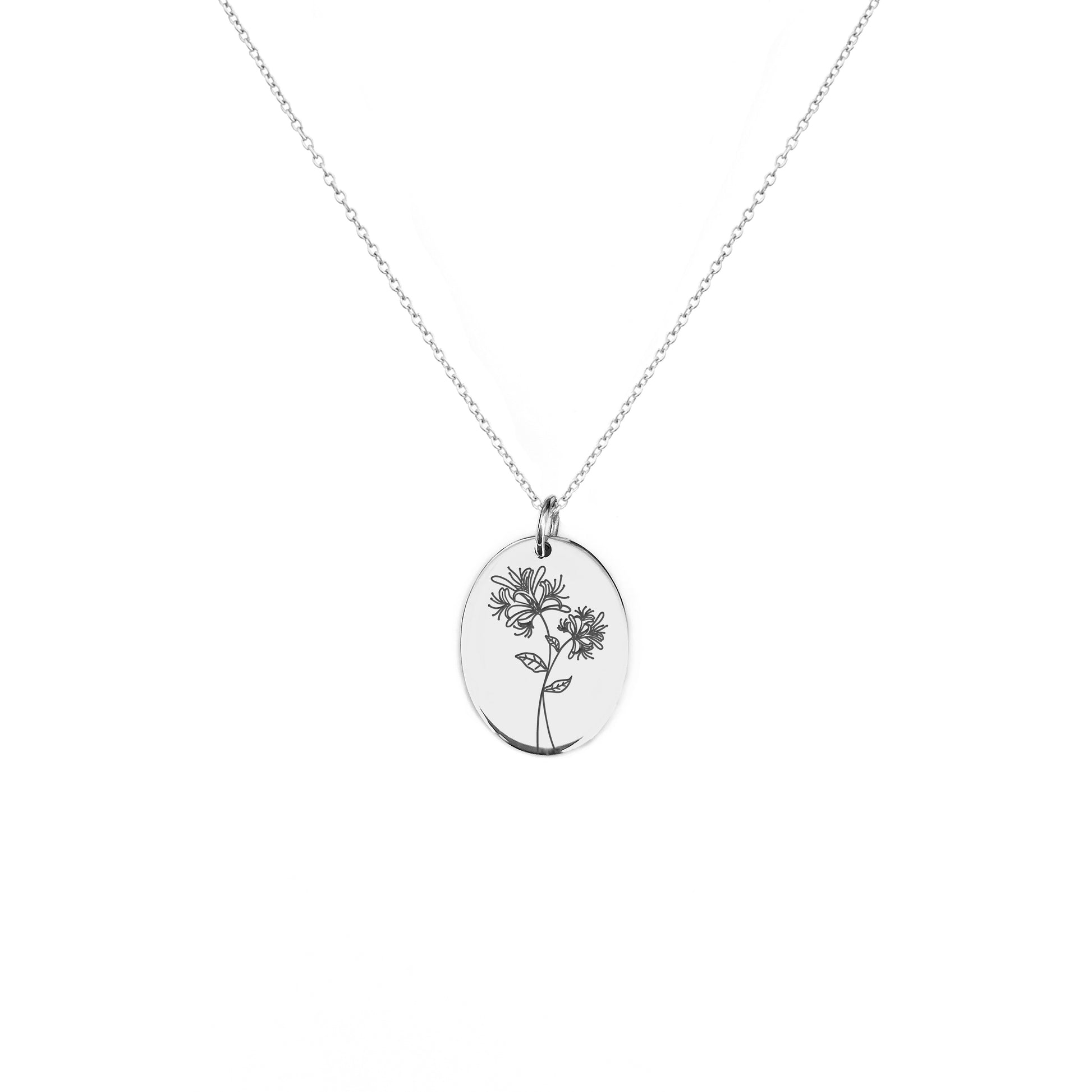 solid white gold oval pendant necklace engraved with a Honeysuckle the birth flower of June