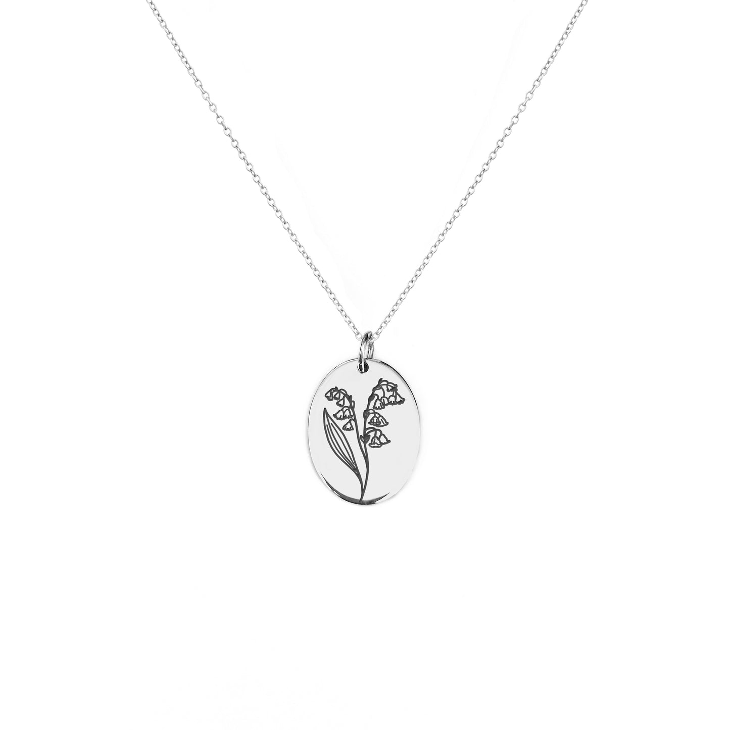 solid white gold oval pendant necklace engraved with the birth flower of May Lily if the valley
