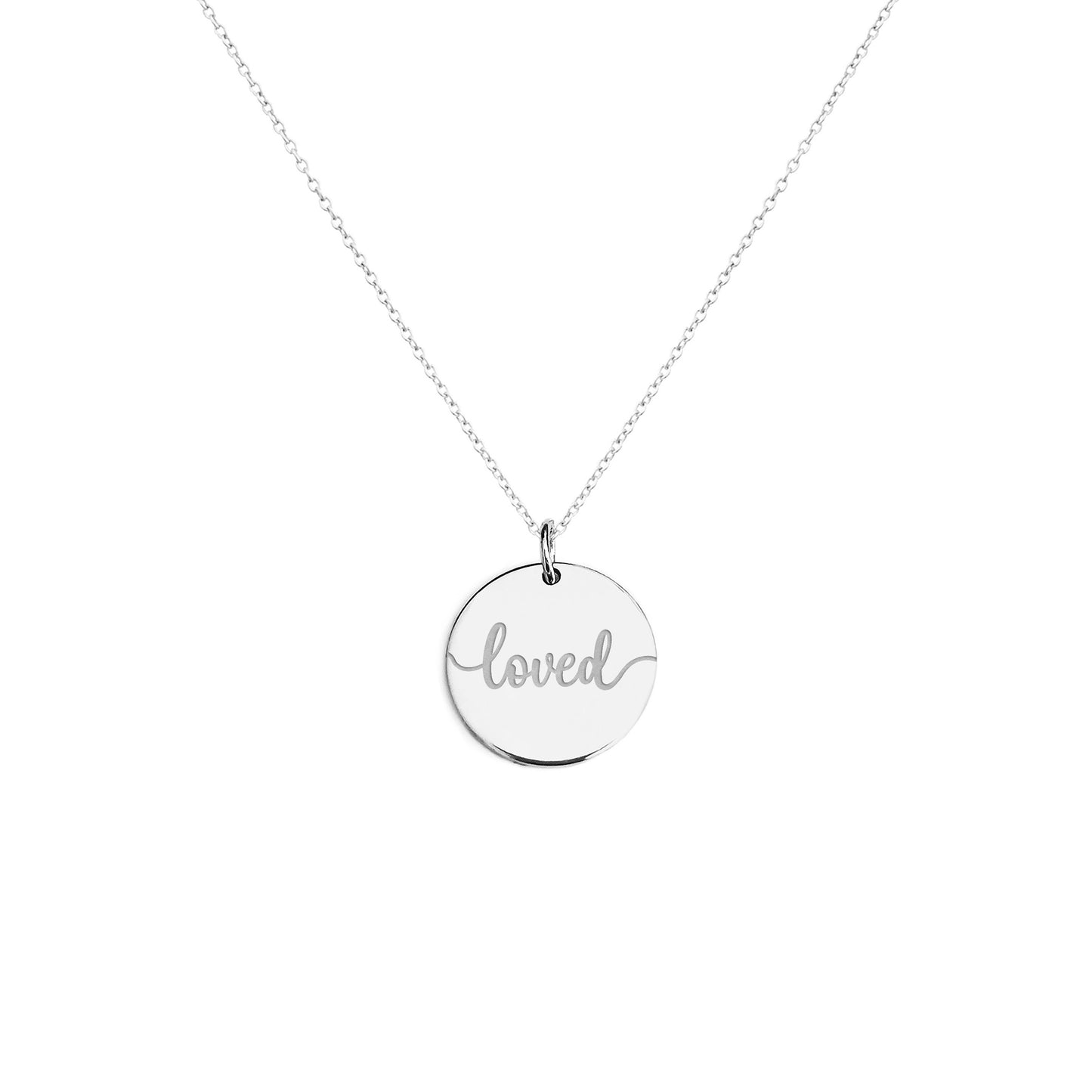 Solid white gold necklace with a round pendant engraved with the word 'loved' on a white background