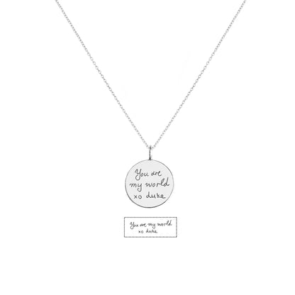 solid white gold necklace with a round pendant with custom handwritten engraving 