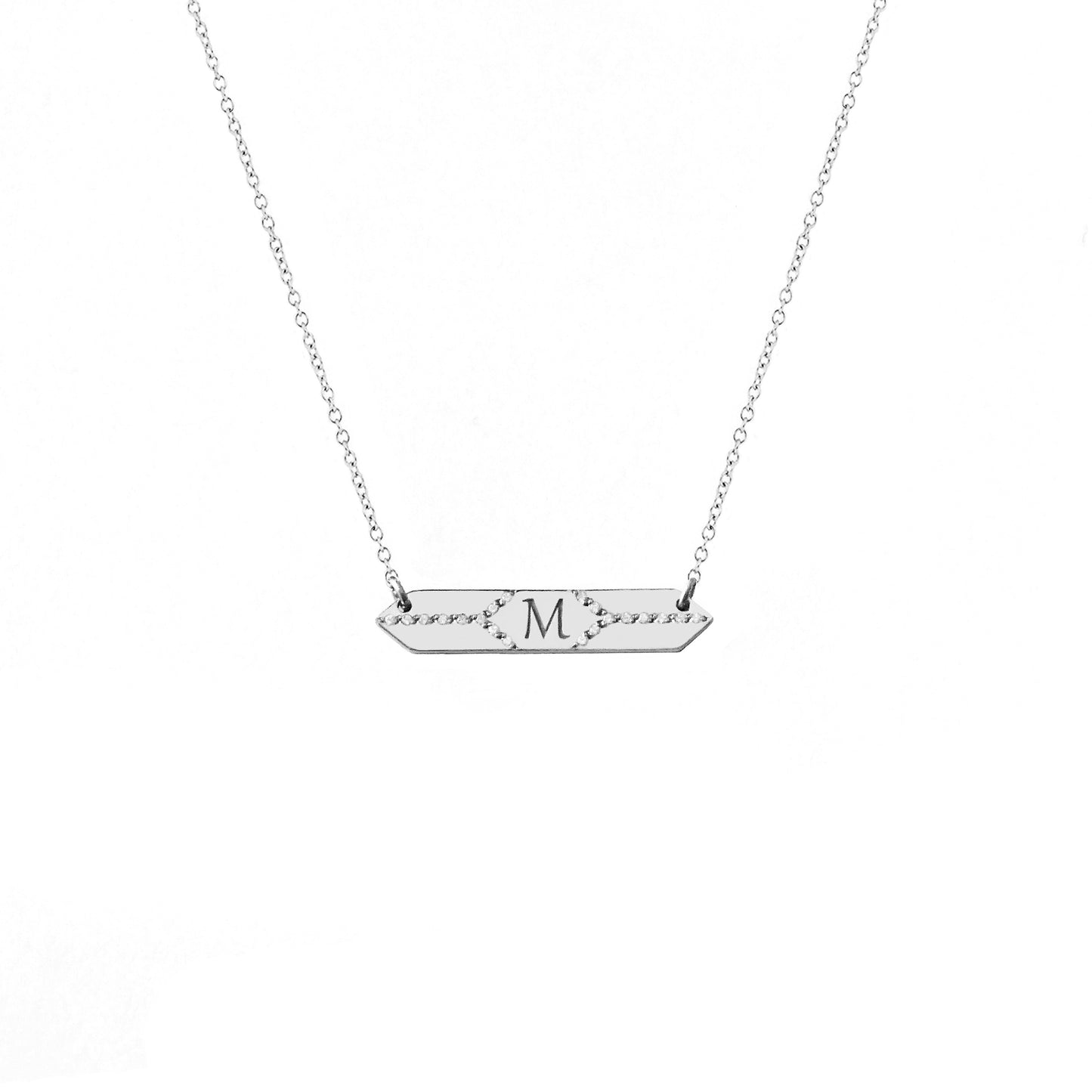 solid white gold hexagon bar necklace set with white diamonds and engraved with a custom initial/monogram in the center