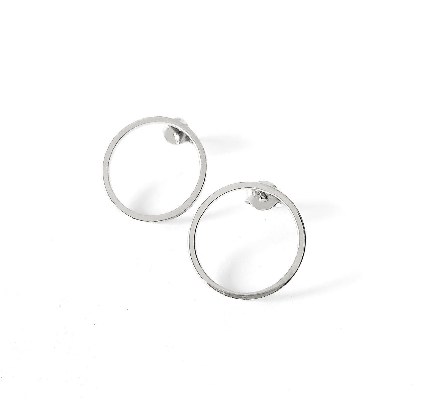 a pair of small open circle hoop stud earrings in solid white gold