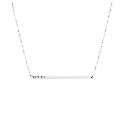 solid white gold thin bar necklace set with three tiny white diamonds