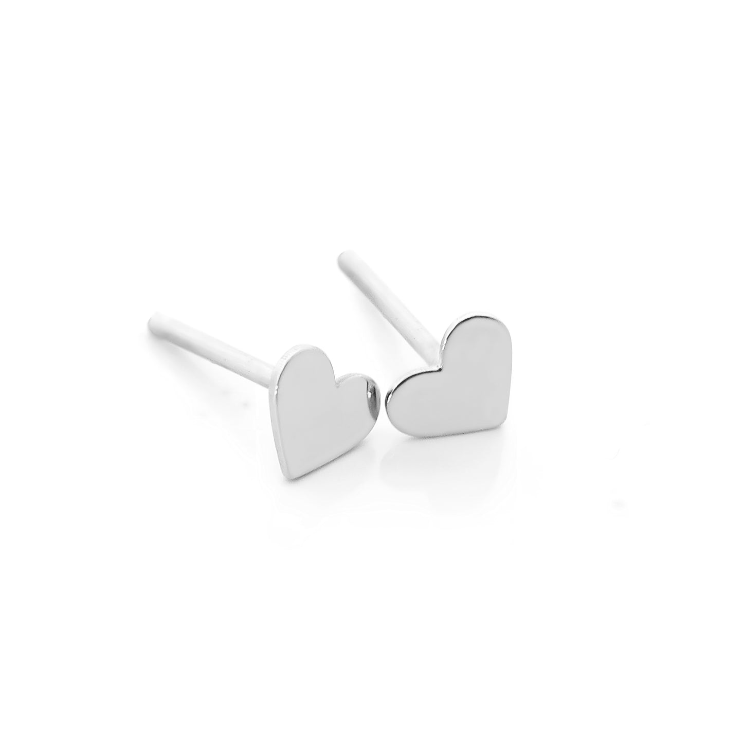 a pair of solid white gold hear-shaped stud earrings