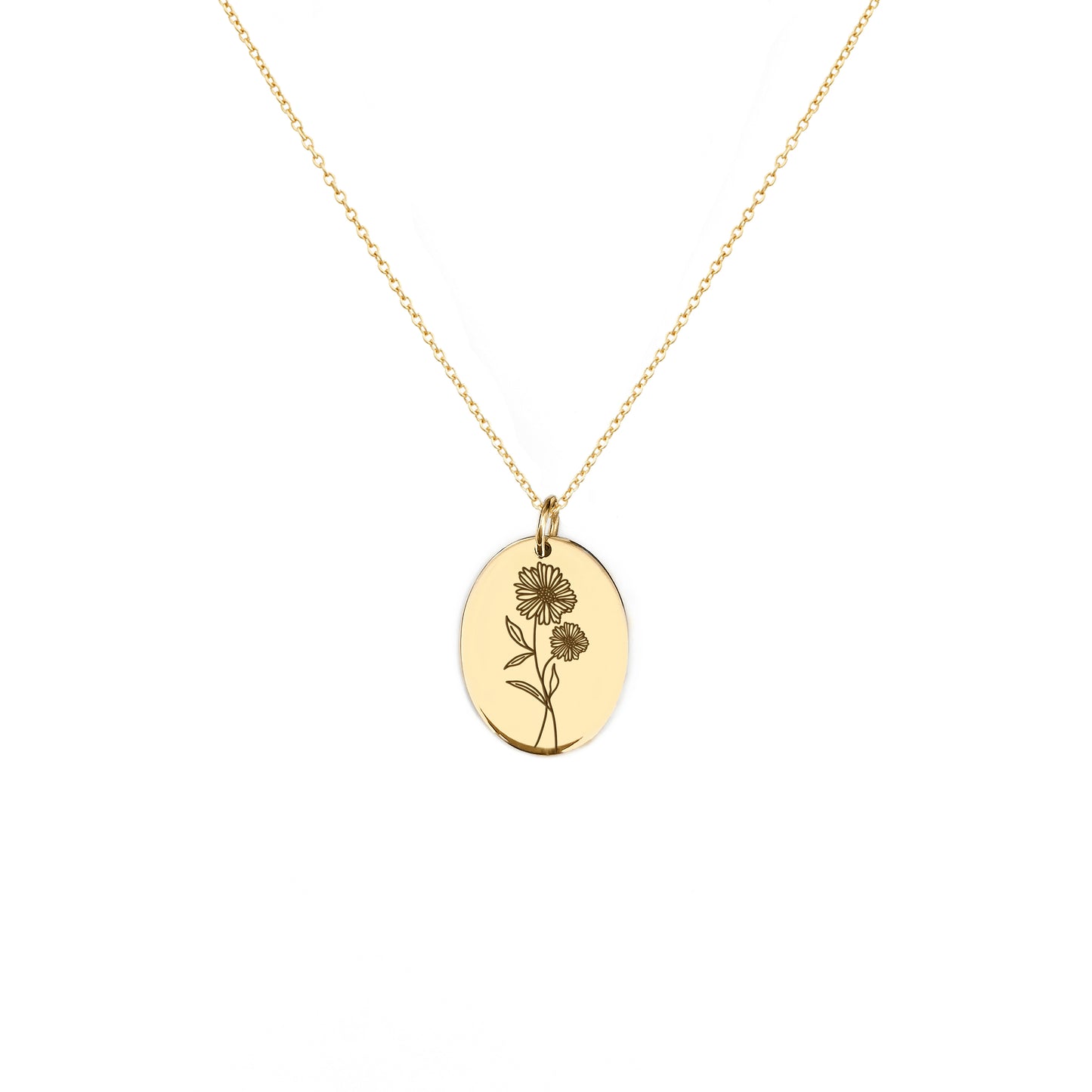 solid yellow gold oval pendant necklace engraved with the birth flower of April Daisy