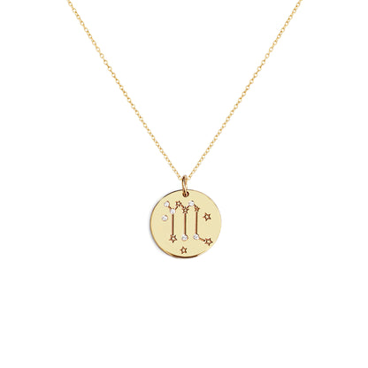 solid yellow gold necklace with a 14mm disc pendant engraved with a zodiac sign and set with six tiny diamonds