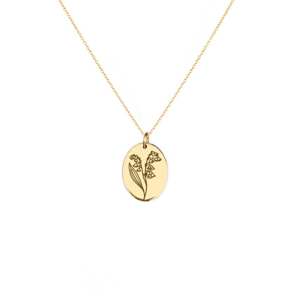 solid yellow gold oval pendant necklace engraved with the birth flower of May Lily if the valley