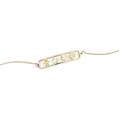 open bar bracelet with four lucky charms, a hamsa, a horseshoe, a clover and an evil eye made in solid yellow gold