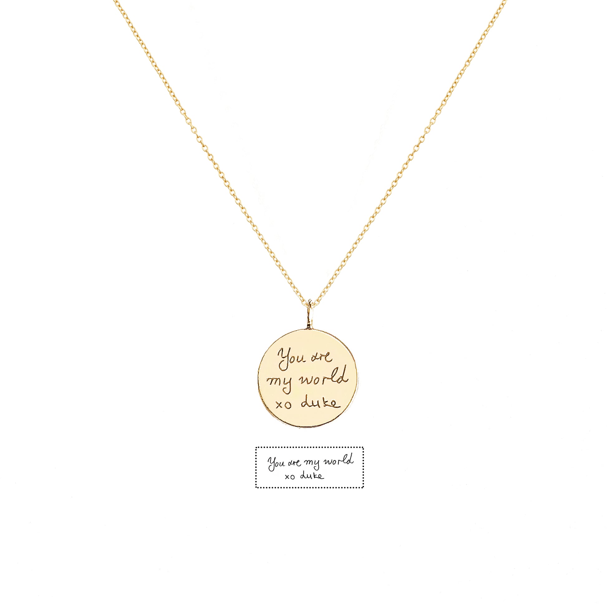 solid yellow gold necklace with a round pendant with custom handwritten engraving 