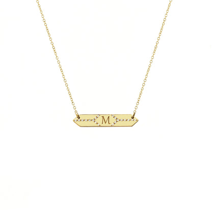 solid yellow gold hexagon bar necklace set with white diamonds and engraved with a custom initial/monogram in the center