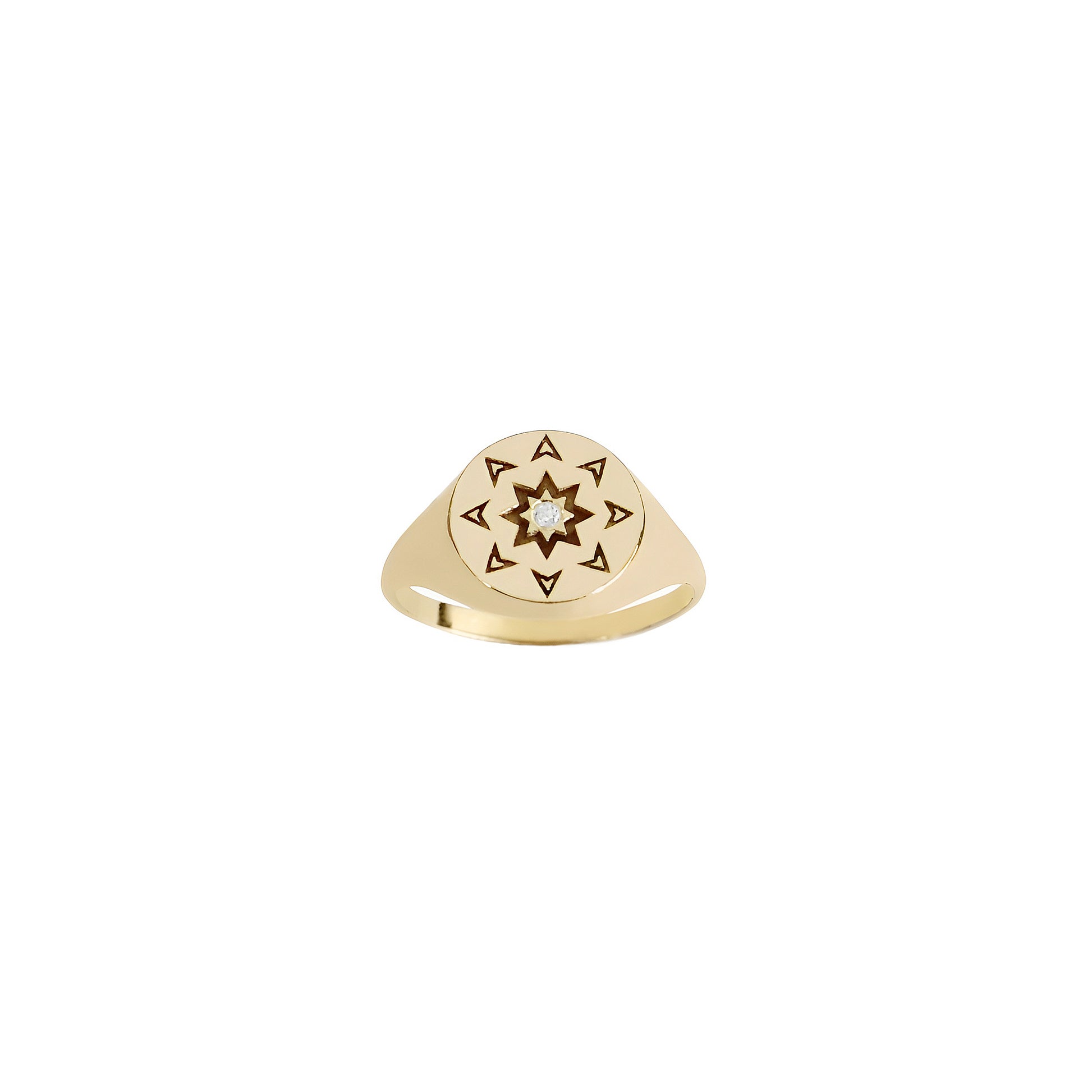 front view of a solid yellow gold round signet ring with a north star starburst design and a diamond on the center