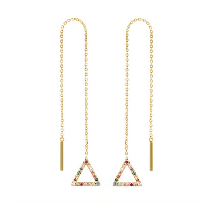 a pair of solid yellow gold threader earrings with a small triangle at the end set with rainbow sapphires