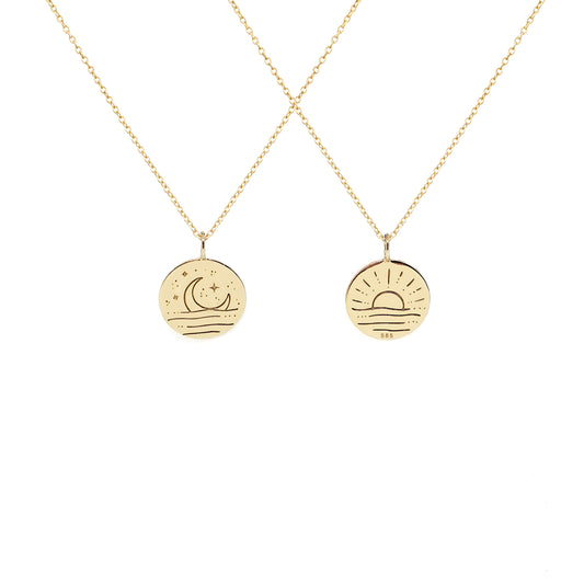 solid yellow gold necklace with reversible pendant engraved with a moon on one side and a sun on the other side 