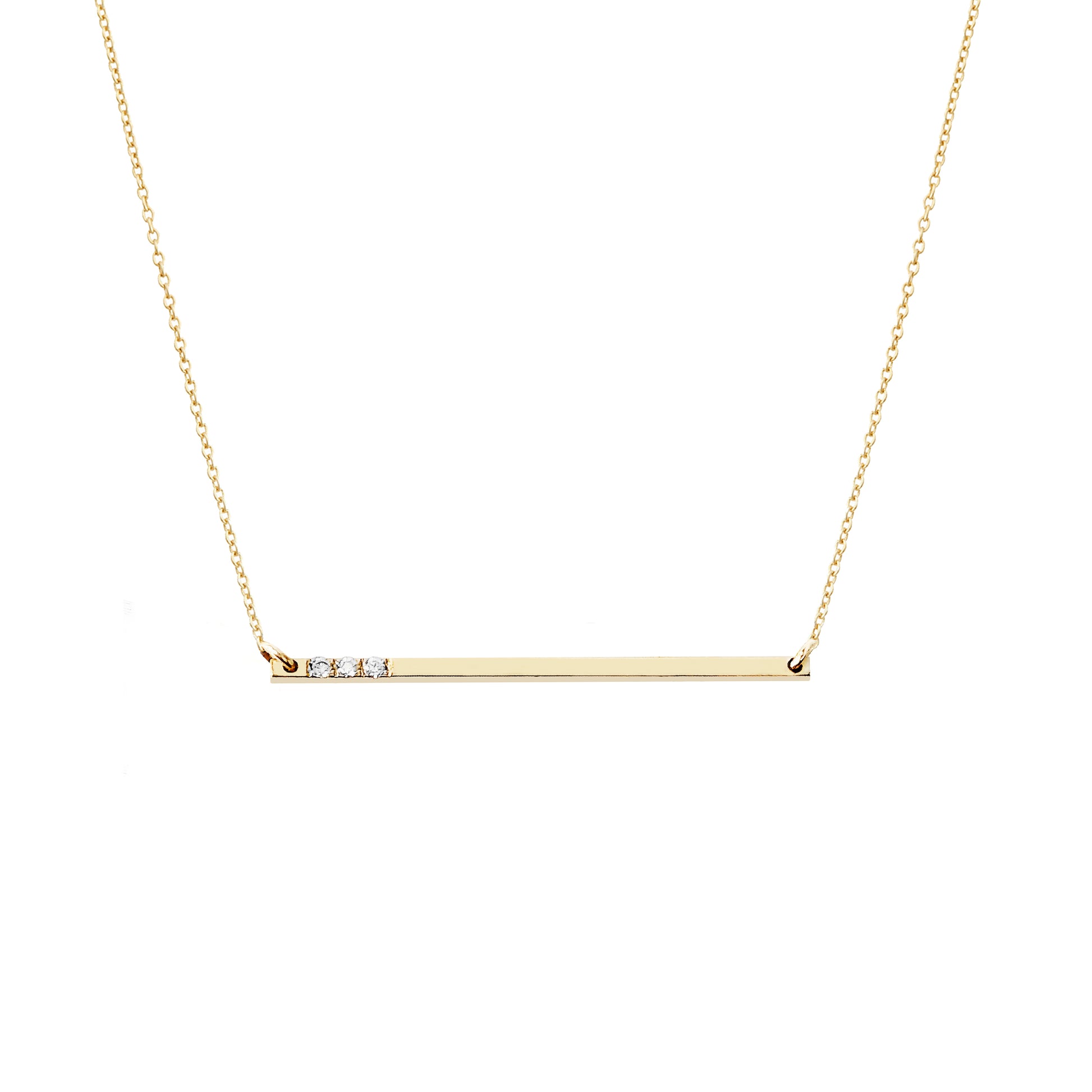 solid yellow gold thin bar necklace set with three tiny white diamonds