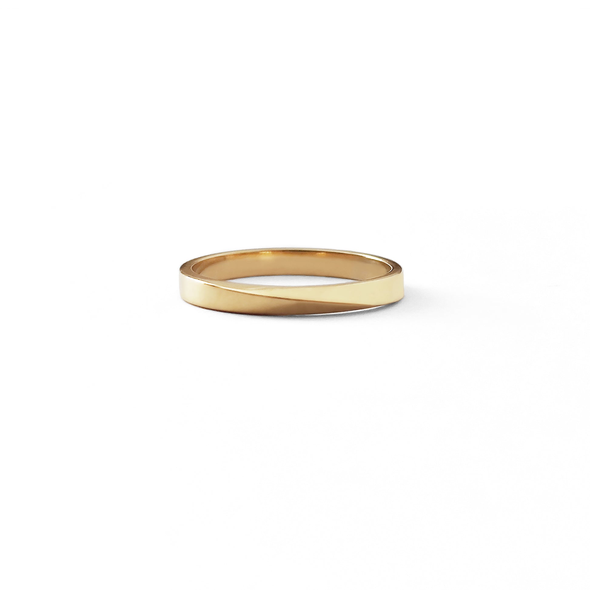 solid yellow gold thin mobius twist wedding band