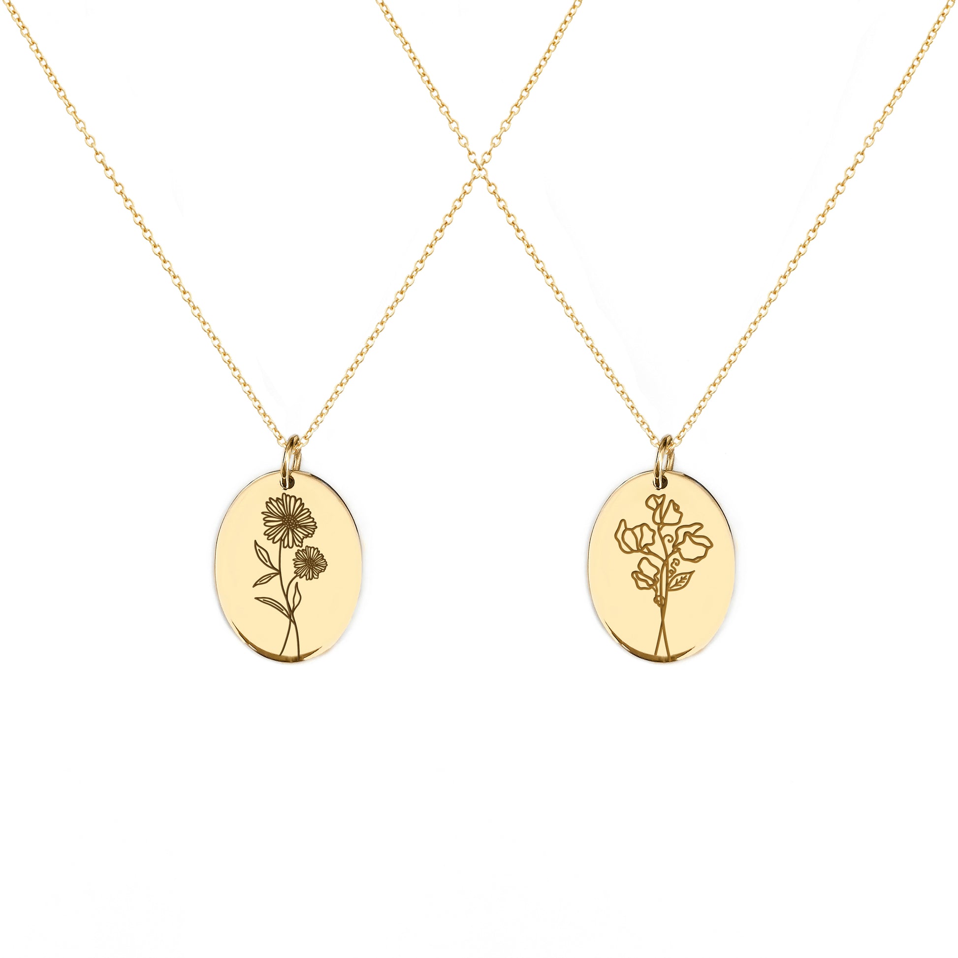 two solid yellow gold oval pendant necklaces engraved with the birth flowers of April Daisy and Sweet Pea