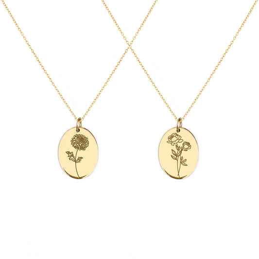 two solid yellow gold oval pendant necklaces engraved with the birth flowers of November Chrysanthemum and Peony