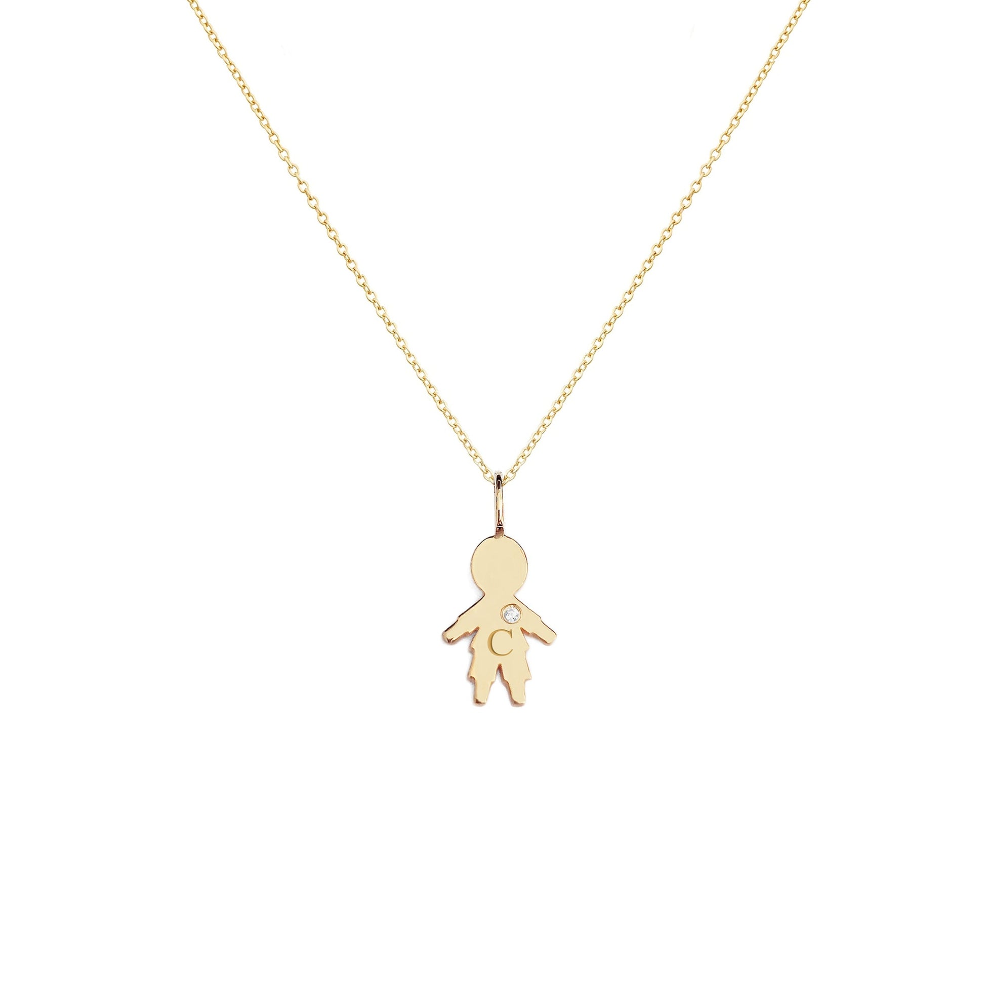 solid yellow gold necklace with tiny boy outline charm engraved with a monogram and set with tiny diamond