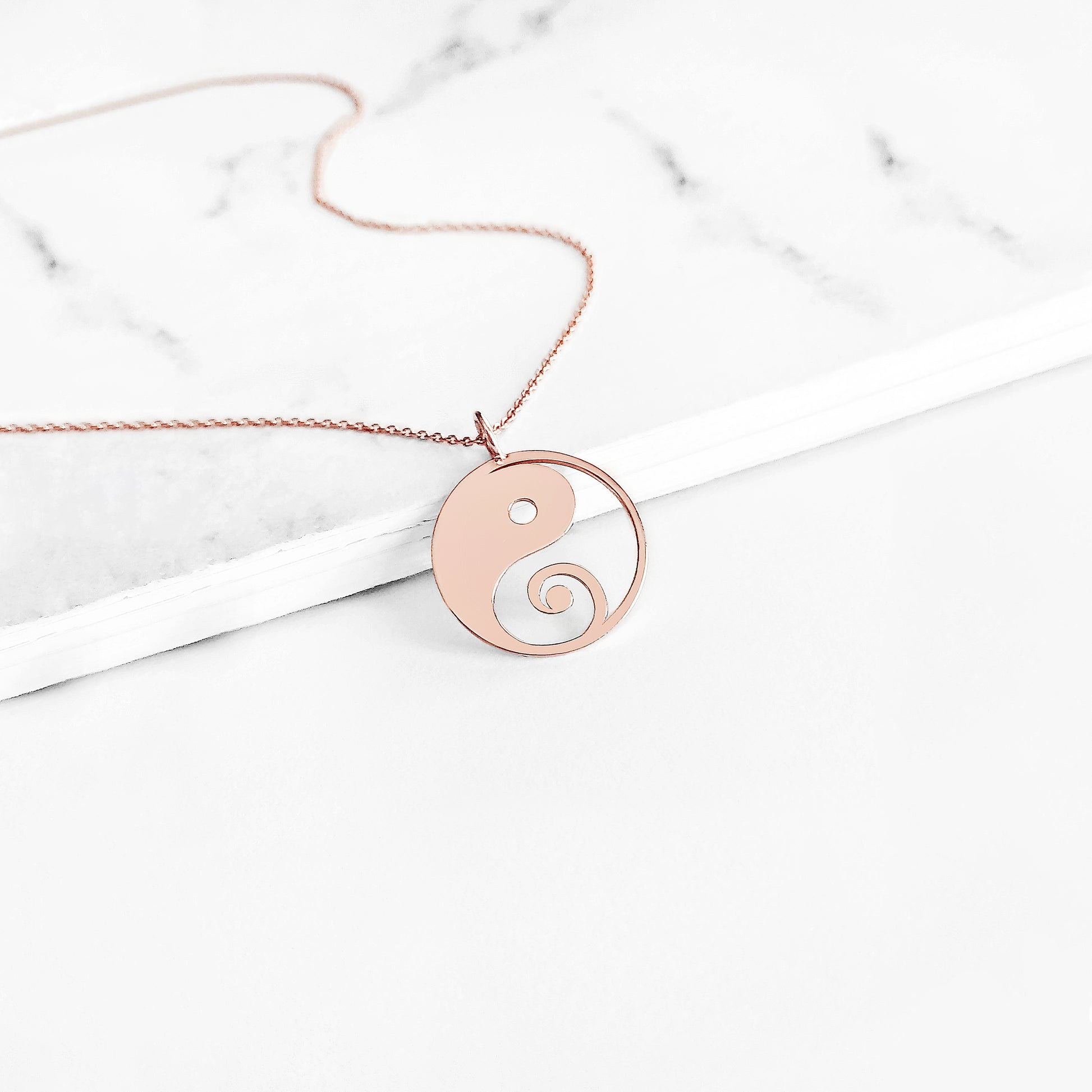 rose gold necklace with a 16mm yin yang pendant